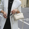 Natural Cowhide Drawstring Nine West Handbags With Bubble Pattern