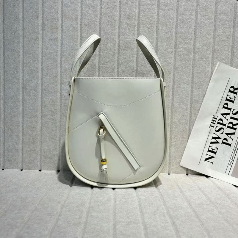 Handcrafted Cow Leather Hammock Slice Tote Bag Versatile and Chic 