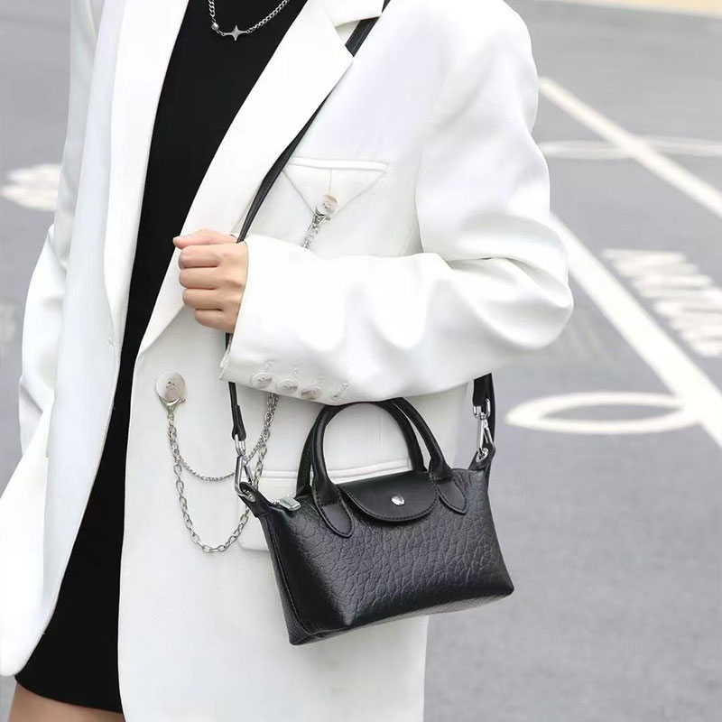 Natural Cowhide Drawstring Nine West Handbags With Bubble Pattern