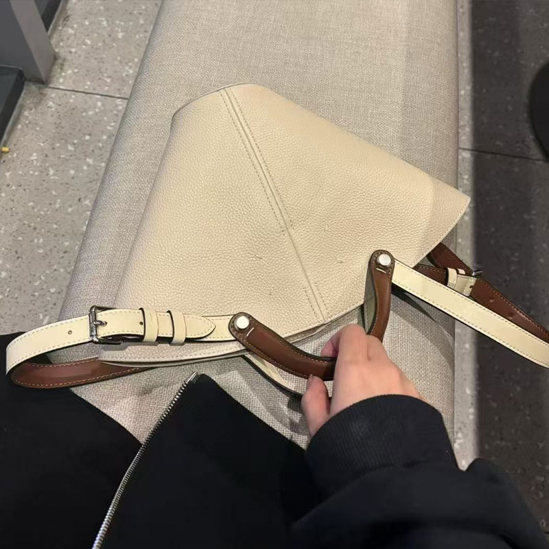 Minimalist top layer cowhide handbag